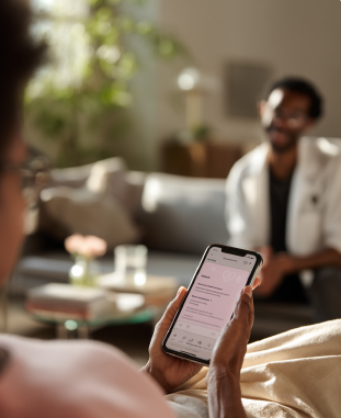 Patient reviewing health data with doctor